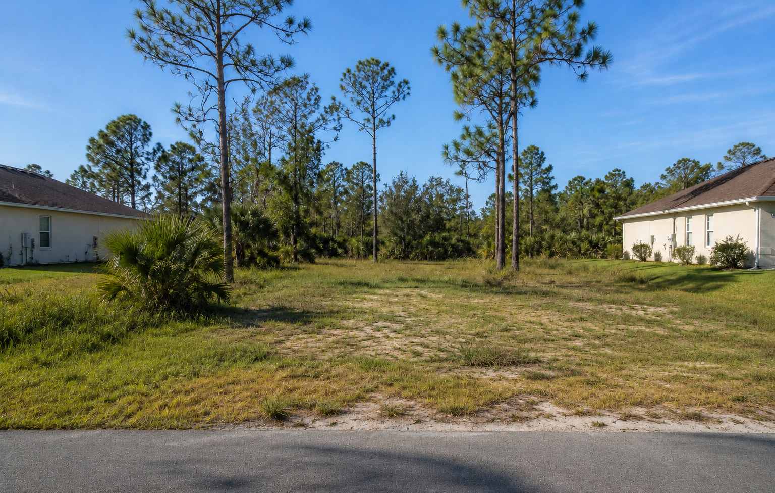 Residential infill parcel on a paved street in Palm Bay, Florida